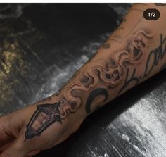 a person with a tattoo on their arm