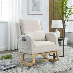 a white rocking chair in a living room