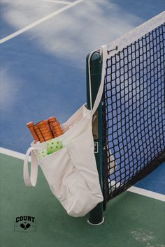 Pickleball paddles and balls in a tote bag. Sunlight can be seen shimmering on the pickleball court. Paddle Tennis Aesthetic, Pickleball Photography, Pickleball Photoshoot, Tennis Court Design, Pickleball Aesthetic, Playing Pickleball, Ball Aesthetic, Summer Sport