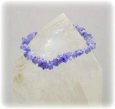 Tanzanite Bracelet - Stretch Bracelet - Gemstone Bracelet, Tanzanite Jewelry, Gemstone Jewelry, Genuine Gemstone, Tanzanite Chip Bracelet: Tanzanite is a member of the zoisite family and is a one source only gemstone. This means that it can only be found in one place in the entire world. It is an amazing combination of purples, blues, and reds. Tanzanite is heat treated to obtain its beautifully distinctive and unique color. Truly a rare stone, Tanzanite is far more rare than Diamonds, Emeralds, Blue Gemstone Crystal Bracelet Gift, Blue Crystal Bracelet With Stones For Gift, Blue Crystal Bracelet With Stones As A Gift, Blue Crystal Bracelet Gift, Blue Amethyst Bracelet For Healing, Spiritual Blue Amethyst Bracelets, Blue Amethyst Bracelets With Natural Stones, Blue Amethyst Beaded Bracelets For Gift, Blue Amethyst Beaded Bracelets As Gift