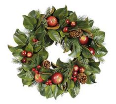 a christmas wreath with apples, holly and pine cones