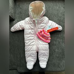 New Without Tags Pink Snowsuit With Full Zipper From Old Navy, 3 To 6 Month. Never Been Used In Perfect Condition. Hat Is A Velour, Poppie Stripe In A 6 Month From Magnetic Me. Tag Says, Magnificentbaby.Com, This Was A Hat I Bought Along With Other Items. Unfortunately, It Did Not Fit. New With Tags On. Non-Smoking Home With No Pets. All Sales Are Final. Playful Pink Winter Onesie, Winter Playwear For Babies In Pink, Winter Pink Onesie For Playtime, Pink Winter Onesie For Playtime, Winter Playtime Pink Onesie, Pink Fitted Onesie For Winter, Baby Girl Pink, Snow Suit, Navy Pink