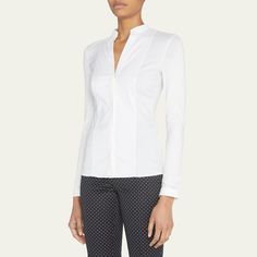 Akris punto blouse in cotton poplin, featuring a jersey back. Split neckline. Long sleeves. Hem hits hips. Fitted. Cotton. Made in Italy. Classic Tops For Workwear, Fitted Elastane Tops For Office, Modern Fitted Blouse For Business Casual, Modern Stretch Blouse For Workwear, Formal Fitted Top In Elastane, Chic Elastane Workwear Blouse, Chic Elastane Blouse For Work, Designer Sportswear, Akris Punto