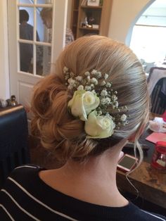 a woman with flowers in her hair