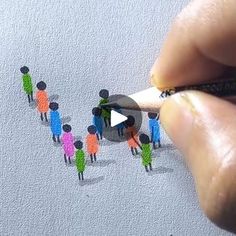 someone is drawing people on the wall with pencils