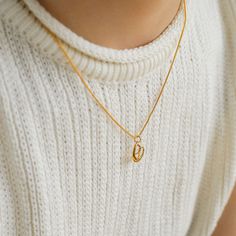 Well crafted and elegant, this necklace features a delicate pendant shaped like a slice of lye bread, perfect for everyday wear or to add a touch of whimsy to your overall look. The delicate chain adds to the elegance of the necklace, ensuring it hangs gracefully around your neck. Metal: 18K Recycled Gold Plated Vermeil on Recycled Sterling Silver/Recycled Sterling Silver Necklace Length: 420-470mm Pendant Length:18mm Weight:5g Water Bread, Delicate Pendant, Edison Pearls, Alkaline Water, Delicate Chain, Tiger Eye Stone, Recycled Gold, Recycled Sterling Silver, Sterling Silver Necklace