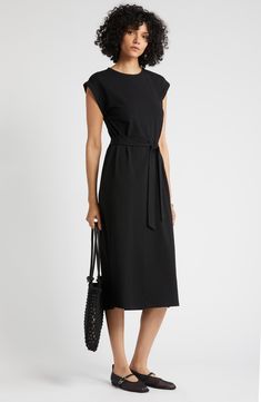 A tied waist adds soft structure to an endlessly wearable knit dress perfected with a pair of discreet pockets. 47 1/2" length (size medium) Crewneck Short sleeves Side-seam pockets Removable sash 93% cotton, 7% spandex Machine wash, tumble dry Imported Chic Nordstrom Midi Dress, Black Midi Dress With Tie Waist For Work, Casual Black Belted Midi Dress, Black Midi Dress With Tie Waist, Summer Wardrobe Essentials, Wedding Guest Shoes, Sports Blazer, Made Clothing, Denim Leggings