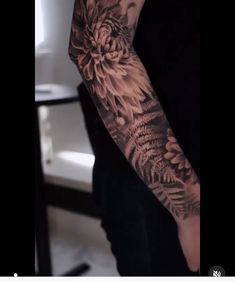 a person with a tattoo on their arm