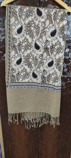 "🔷Avocado color 100% soft cashmere beautiful \"Jamavar\" Shawl/stole 80\"×28\" is fully fully embroidered by our talented and young artist. Jamavar means which is full covered/fill with embroidery. This shawl/shawl is embroidered by Golden, White & Black color thread to make shawl/stole more attractive and beautiful.And the thread of this embroidery is silk thread. 🔷The Product is made of Pure Soft Cashmere Material with beautiful handmade tassels. 🔷The shawl/stole have beautiful handmade Brown Embroidered Pashmina Shawl, Bohemian Pashmina Shawl With Multicolor Resham Embroidery, Bohemian Pashmina Shawl With Intricate Embroidery, Bohemian Pashmina Scarf With Intricate Embroidery, Bohemian Pashmina Scarves With Intricate Embroidery, Bohemian Pashmina Shawl With Chikankari Embroidery, Cream Embroidered Pashmina Scarf, Bohemian Embroidered Pashmina Shawl, Embroidered Bohemian Pashmina Shawl