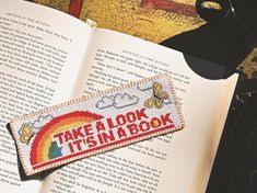 🌈🦋Take a look, it's in a book! Keep track of where you're at on your reading adventure with this nostalgic cross-stitch bookmark pattern! The (butterfly in the) sky is the limit, as you can use the suggested DMC colors or customize them to create the perfect cozy bookmark for you or your loved one's reading journey 📖 Cross stitch bookmark pattern PDF download Pattern size: 105x37 stitches Fabric count: 14 ct  Finished size: 7.5 x 2.6" Total DMC colors: 10 *PATTERN DOWNLOAD INFO --- After your Cozy Cross Stitch Pattern, Cross Stitch Patterns Books, Cross Stitch Bookmarks Free Pattern, Fun Cross Stitch Patterns, Crosstitch Bookmark, Free Cross Stitch Bookmark Patterns, Nerdy Cross Stitch Patterns, Cross Stitch Gift Ideas, Cross Stitch Bookmark Patterns Free