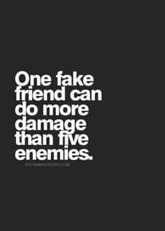 a black and white photo with the words one fake friend can do more damage than five en