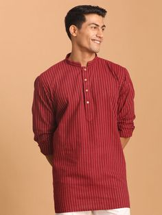 SHVAAS By VASTRAMAY Men's Maroon Striped Cotton Short Kurta The SHVAAS By VASTRAMAY Men's Maroon Striped Cotton Short Kurta offers a blend of traditional and modern design, perfect for any casual or semi-formal occasion. This kurta is crafted from high-quality cotton, ensuring comfort and breathability throughout the day. Features Stylish maroon striped pattern Comfortable cotton fabric Classic short kurta design Perfect for casual and semi-formal events Easy to pair with jeans or trousers Speci