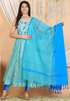 Pure Kota Tissue Anarkali Kameez in Pastel Blue Color. This Readymade Round Neck and Sleeveless attire with Shantoon Lining is Enhanced with Resham and Zari Work. Available with a Shantoon Churidar in Royal Blue and a Kota Doriya Dupatta in Shaded Blue. The Kameez and Bottom Lengths are 50 and 52 inches respectively. Do note: 1.)Accessories shown in the image are for presentation purposes only and length may vary upto 2 inches. 2.)Slight variation in actual color vs. image is possible. We sell a Blue Semi-stitched Churidar With Resham Embroidery, Blue Sleeveless Traditional Wear With Zari Work, Blue Sets With Sheer Dupatta For Diwali, Blue Sleeveless Traditional Wear For Festive Occasions, Festive Sleeveless Blue Traditional Wear, Blue Embroidered Tissue Silk Salwar Kameez, Blue Churidar With Sheer Dupatta, Blue Designer Dress In Tissue Silk, Designer Blue Tissue Silk Dress