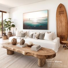 a living room with a surfboard on the wall and a couch in front of it