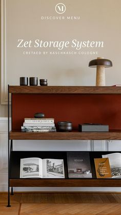 a book shelf with books and candles on it