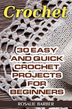 the book crochet is on display in front of a wooden table with white doily