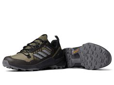 adidas Outdoor Terrex Swift R3 - Men's Shoes : Focus Olive/Grey Three/Core Black : Fast on any hike, the adidas Outdoor Terrex Swift R3 combines the lightweight design and cushioning of a trail running shoe with the versatility and stability of a hiking boot. Textile and synthetic upper with a lace-up style and heel pull tab. Padded tongue and collar for added comfort. Textile lining and insole. Molded sockliner with a Lightstrike EVA midsole. Rock protection plate and reinforced heel support. S Functional Adidas Lace-up Trail Running Shoes, Waterproof Lace-up Running Boots With Vibram Sole, Adidas Functional Trail Running Shoes, Functional Adidas Running Shoes For Hiking, Functional Adidas Hiking Running Shoes, Sporty Hiking Running Shoes With Boost Midsole, Sporty Hiking Boots With Boost Midsole, Sporty Trail Running Shoes With Boost Midsole For Outdoor, Sporty Trail Running Shoes With Boost Midsole For Hiking