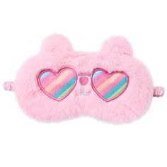 a pink eye mask with hearts on it