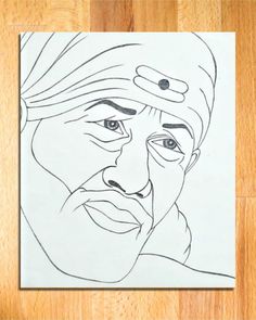 a drawing of a man with a turban on it's head and eyes