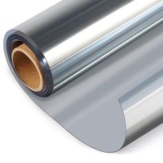 a roll of aluminum foil on a white background