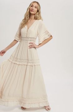 Size: Large Flowy V-neck Midi Dress With Lace Trim, Bohemian V-neck Dress With Crochet Trim, V-neck Vacation Dress With Lace Sleeves, Feminine Maxi Dress With Delicate Lace, V-neck Maxi Dress With Lace Patchwork For Beach, Bohemian V-neck Maxi Dress With Lace Patchwork, V-neck Lace Patchwork Maxi Dress For Beach, Spring Short Sleeve Delicate Lace Dresses, Elegant Flowy V-neck Lace Dress