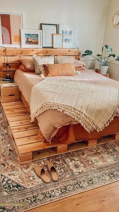 a bed made out of wooden pallets in a bedroom