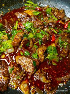 the food is prepared and ready to be cooked in the wok on the stove