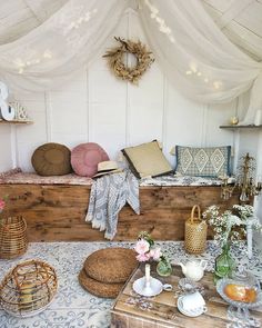 a room filled with lots of different types of furniture and decor on top of a table