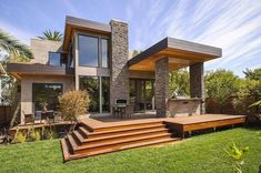 an outdoor patio with steps leading up to it