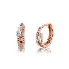 A pair of 0.19 carat diamond huggie earrings is a lovely choice, especially with a combination of dazzling pear-shape and round-cut diamonds. The 14K rose gold setting adds a touch of warmth and elegance. With the unique design, these huggies will make a charming accessory for various occasions, from casual outings to formal events. Diamond Huggies Earrings, Luxury Earrings Aesthetic, Diamond Shaped Engagement Ring, Diamond Huggie Earrings, Diamond Huggies, Engagement Ring Shapes, Luxury Earrings, Earring Trends, Fine Jewelry Bracelets