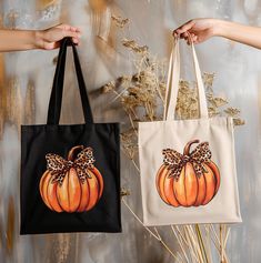 These awesome, shoulder carrying, 100% cotton, canvas tote bags feature a simple pumpkin with a leopard print bow on top, on the front, and measure 15"x16" making it perfect for everyday use.  The bag features 20" handles (made from the same canvas), making it easy to carry even with a week's worth of shopping, and are durable enough to last for years.  The tote is available in color choices or natural or black. Use these Fall lover, medium-sized totes as an eco-friendly option to carry grocery items, store bought good, books, dance shoes, gym items, or as an overnight bag.  They also make a great end of year teacher or student gift! *100% cotton canvas *Heavy fabric (12 oz/yd² (406.9 g/m *Sewn-in label CARE INSTRUCTIONS - Hand wash; Tumble dry: low heat; Non-chlorine: bleach as needed; Do Brown Canvas Bag For Fall, Brown Cotton Bags For Fall, Fall Canvas Tote Bag For Shopping, Canvas Tote Bag For Fall Shopping, Canvas Shopping Bags For Fall, Rectangular Canvas Bags For Fall, Fall Canvas Shopping Bags, Fall Tote Bag As Gift, Cheetah Print Pumpkin