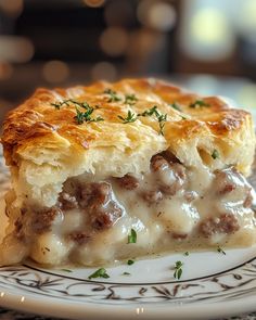 a piece of meat and cheese pie on a plate