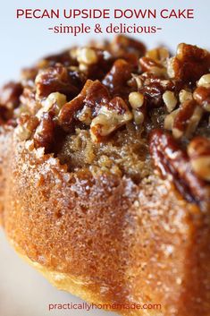 pecan upside - down cake with nuts on top and text overlay that reads pecan upside down cake simple & delicious