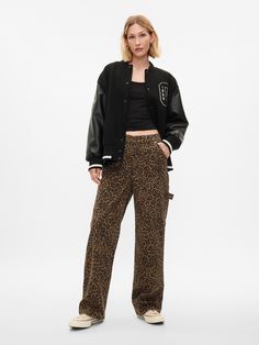 Fit: A full-length loose jean that's fitted on the waist & relaxed all the way down.  Fabric: 97% Cotton, 3% Stretch.  Stretch: Low Stretch Jeans.  Authentic denim with a soft & easy lived-in feel. ​ Rise: Mid Rise Jeans.  Look: A five-pocket jean in a brown cheetah wash.  Details: Zip fly, five-pocket styling & cargo pockets at sides.  Responsibly Made: This pair of denim is part of our water-saving Washwell program.  Compared with conventional wash methods, Washwell uses at least 20% less water and has saved over a billion liters of water since 2016.  Our Mid Rise Jean has a 10" 25 cm) rise. ​ Relaxed through the hip & thigh.  Loose, straight leg.  Full-length jean.  Hits below the ankle. ​ 17" 43 cm) leg opening.   ​ Inseam: Petite 27. 5" 67. 5 cm), Short 28. 5" 72 cm), Regular 30" 76 c Big Fur Coat, Coffee Date Outfit, Leopard Jeans, Leopard Print Pants, Leopard Pants, Jeans Look, Pant Trends, Jeans Cargo, Date Outfit