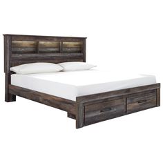 a bed with two drawers underneath it and a white sheet on the bottom half of the bed