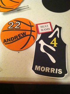 basketball themed magnets on a refrigerator door