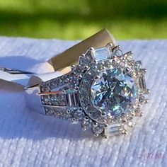 Great Cz Cocktail Ring. Bought At Jtv Some Years Ago, All I Remember Is That It's Bella Luce And Platinum Plated. Bought To Wear To A Formal Dinner But Wore A Different Ring Instead. New With Tags & Size 7. Will Ship Within 24hrs Of Purchase, Usually On The Same Day. I Clean All Jewelry Prior To Shipment. Message Me With Reasonable Offers And Lmk If You Have Any Questions. Thanks! White Diamond Ring With Bling For Anniversary, Anniversary Vvs Clarity Crystal Ring, Exquisite Hallmarked Sterling Silver Rings, Jtv Jewelry Bella Luce, Luxury Multi-stone Cubic Zirconia Rings, Kendra Scott Ring, Cubic Zirconia Multi-stone Open Crystal Ring, David Yurman Ring, Jtv Jewelry