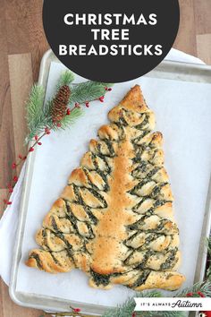 christmas tree breadsticks on a baking sheet