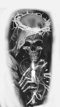 a black and white photo of a skeleton holding a lit candle in its hands with the image of jesus on it