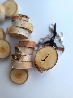 several pieces of wood with a smiley face drawn on them