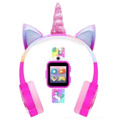 the pink unicorn headphones are next to an ipod