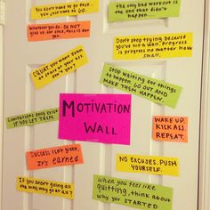 a door with sticky notes attached to it and the words motivational wall written on it