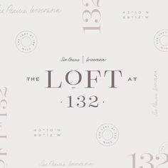 the loft at 123 logo on a white background with black and grey lettering that reads,'the loft at 138 '