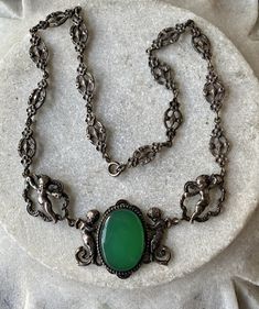 Beautiful Art Nouveau Italian Peruzzi Ornate Sterling Silver Green Chrysoprase Cherub Angele Motif Vintage Antique Necklace Victorian Oval Green Necklace, Ornate Green Oval Necklaces, Handmade Victorian Green Necklaces, Ornate Handmade Green Necklaces, Green Antique Necklace For Gift, Vintage Green Filigree Necklace, Antique Green Oval Necklace, Ornate Green Pendant Necklace, Green Ornate Pendant Necklace