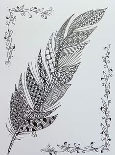 a black and white drawing of a feather