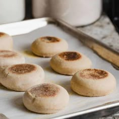 some food that is sitting on a baking sheet in the oven and ready to be cooked