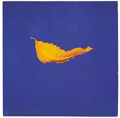 a yellow leaf floating in the air on a blue sky with white border around it