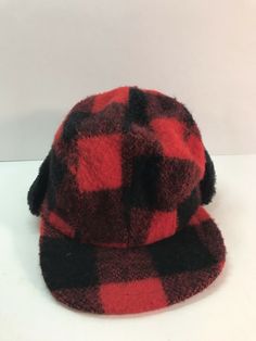 Vintage 100% Wool Plaid Red And Black Hunting Hat Cap With Ear Flaps Small. This is a nice vintage wool hat. There is no size listed but it is appears to be a size small. In good overall condition. See pictures for more info. Vintage Red Outdoor Hat, Red Vintage Outdoor Hat, Red Winter Baseball Cap For Outdoor, Vintage Red Flat Cap, Retro Red Flat Cap, Red Winter Baseball Cap, Red Vintage Hats, Red Baseball Cap For Winter, Red Vintage Winter Hat