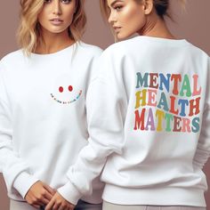 Mental Health Matters Sweatshirt, Mental Health Sweatshirt, Inspirational Sweatshirt, Motivational sweatshirt, Mental Health Gift, Self Love It will become your new favorite Sweatshirt.  👉HOW TO ORDER👈 1️⃣  Choose your T-shirt color 2️⃣  Choose your T-Shirt size 3️⃣  Choose your design & text color 4️⃣ Need more Items? Add the current item in the cart. And If you like to add more items to your order please press the back button and repeat steps 1-3 again. 5️⃣Once all your desired items are in White Long Sleeve Top With Slogan, White Long Sleeve Slogan T-shirt, White Graphic Print Long Sleeve Sweats, White Long Sleeve Sweats With Graphic Print, White Long Sleeve T-shirt With Slogan, White Relaxed Fit Sweatshirt With Slogan, White Slogan Crew Neck Hoodie, White Crew Neck Hoodie With Slogan, White Long Sleeve Sweats With Letter Print