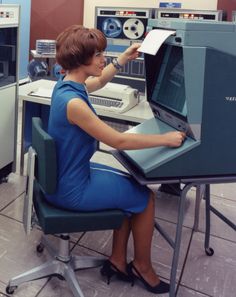 a woman sitting at a desk in front of a computer with the caption i use internet explorer